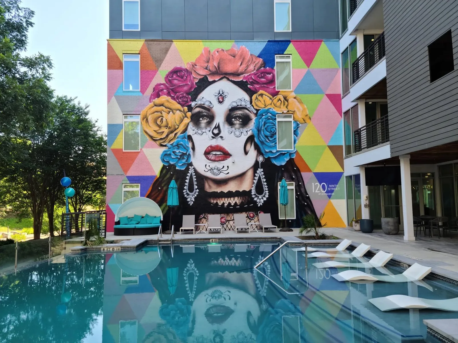 Poolside mural at a restyled San Antonio short-term rental